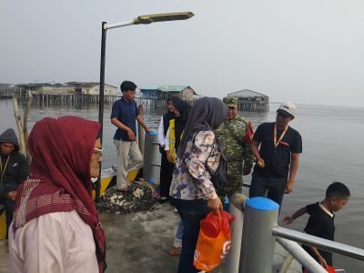 Pos Ramil Panipahan 04/Kubu dan KPLP Awasi Pergerakan Penumpang di Pelabuhan Obak